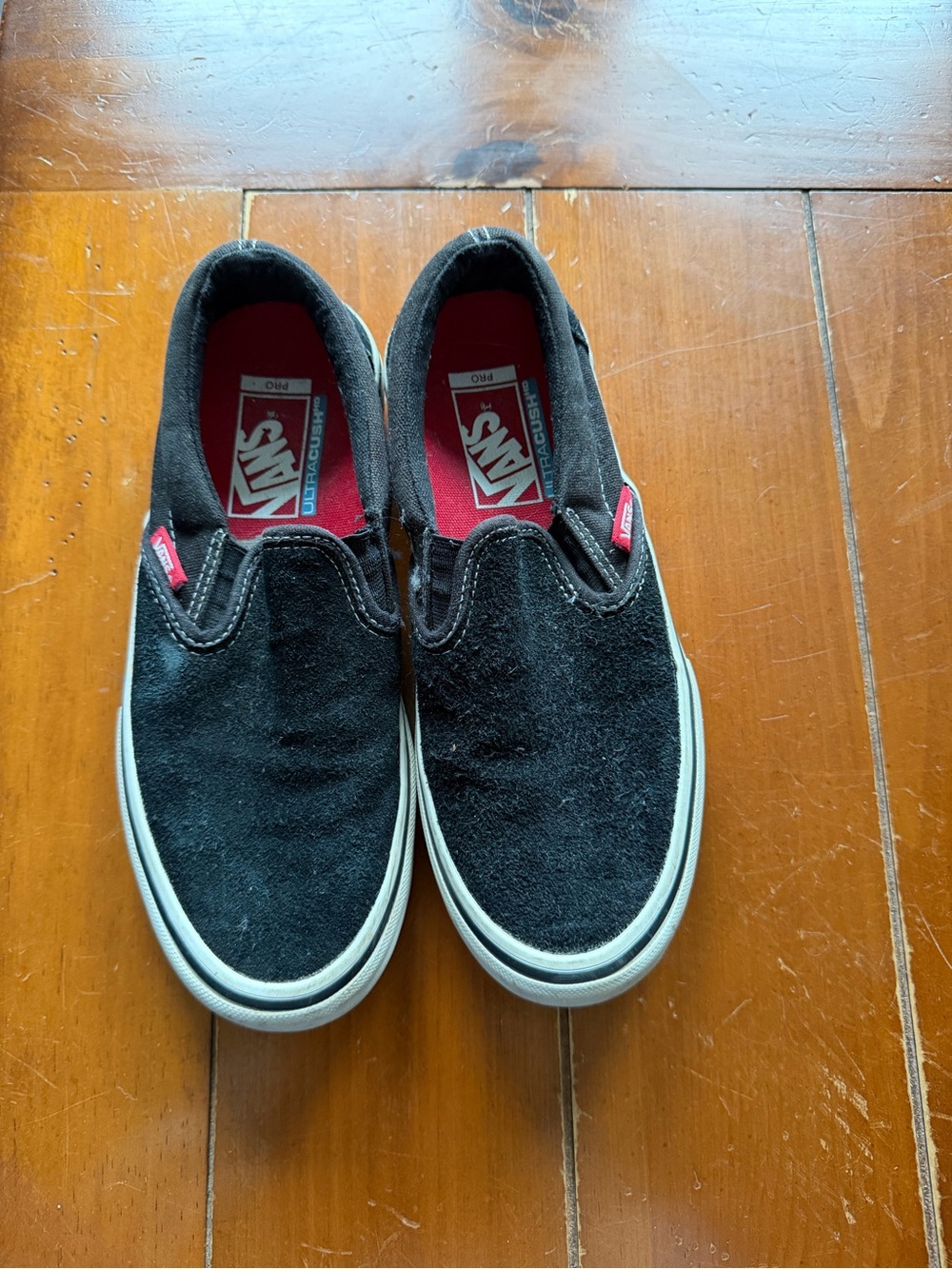Vans Kids Black Slip-On Canvas Sneakers with Red Accents